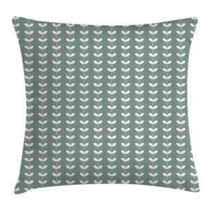 sage green cushions and throws