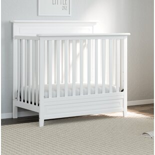 mini crib that converts to toddler bed