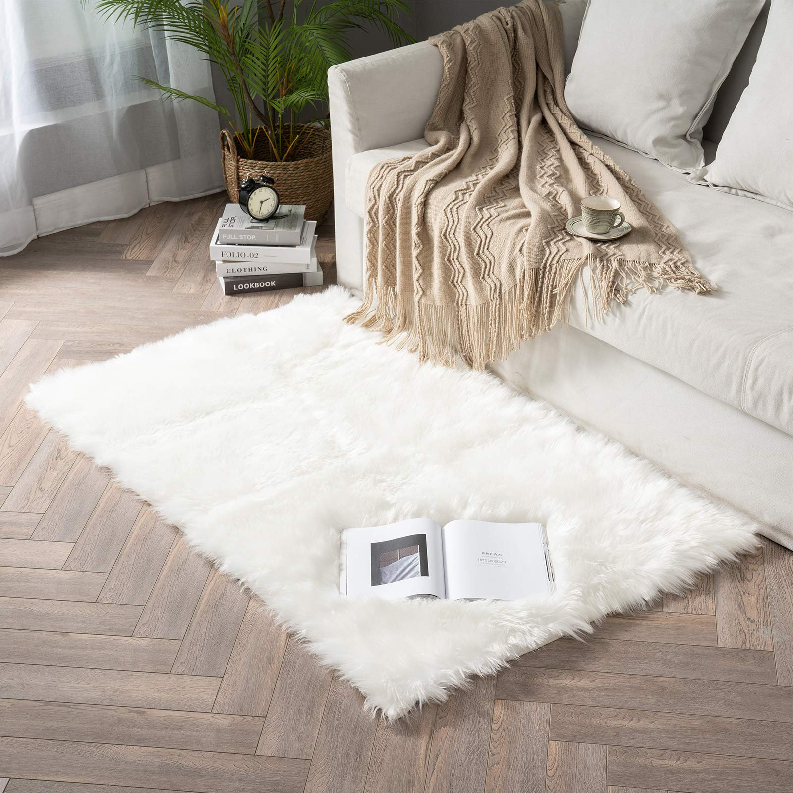 Everly Quinn Kayzlynn Handmade Shag Faux Sheepskin Area Rug in White
