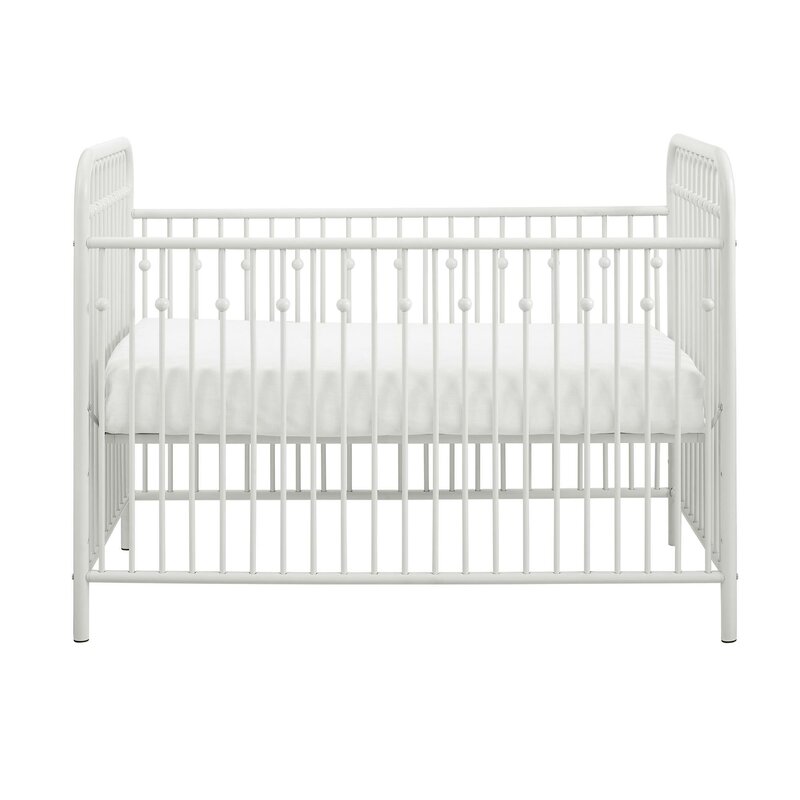 white metal baby crib