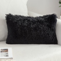 fluffy black pillows