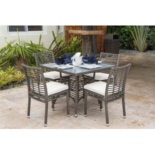 Go to store & view more images 5 Piece Dining Set with Sunbrella Cushions by Panama Jack Outdoor