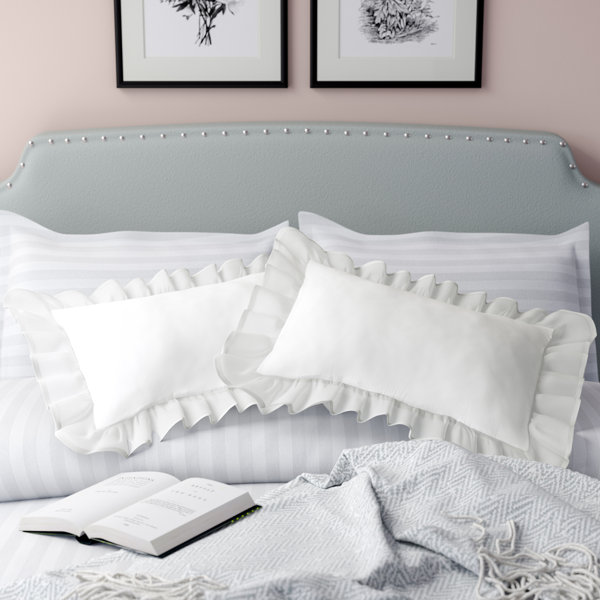 white ruffle pillow case