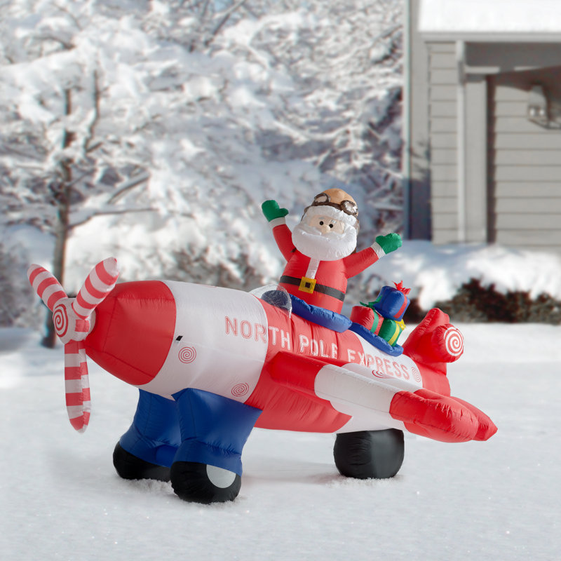 The Holiday Aisle Christmas Animated Santa Claus Driving Airplane