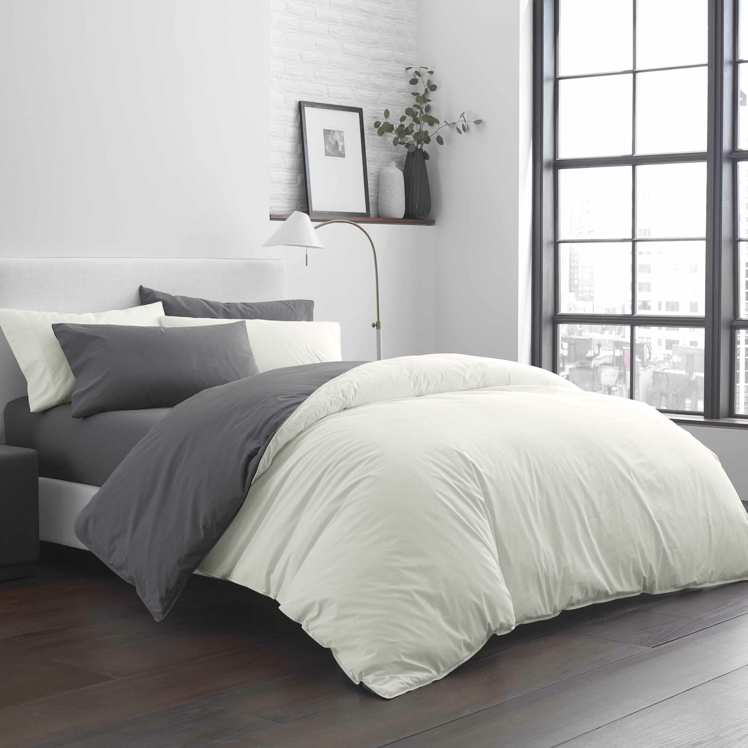 white duvet grey sheets