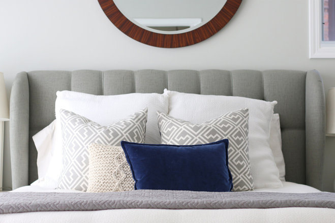 4 Fi For The Blank E Above Your Bed Wayfair A Grey Linen Headboard With Large Round Wooden Mirror Hung Above