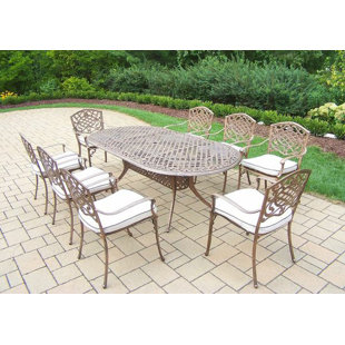 Go to store & view more images Mississippi 9 Piece Dining Set with Cushions by Oakland Living