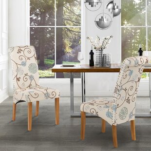 https://secure.img1-fg.wfcdn.com/im/55605471/resize-h310-w310%5Ecompr-r85/1219/121957584/Gayola+Side+Chair+in+Floral.jpg