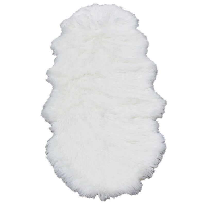 white fur rug round