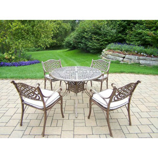 Go to store & view more images Mississippi 5 Piece Dining Set with Cushions by Oakland Living