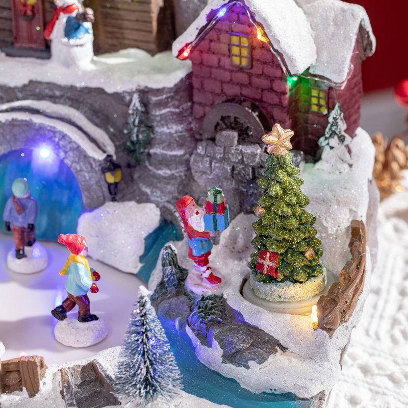 The Holiday Aisle® Christmas Village Skating Pond Animated Winter 