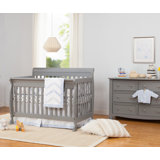 gray baby crib and dresser set