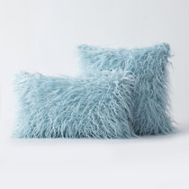 blue furry pillow
