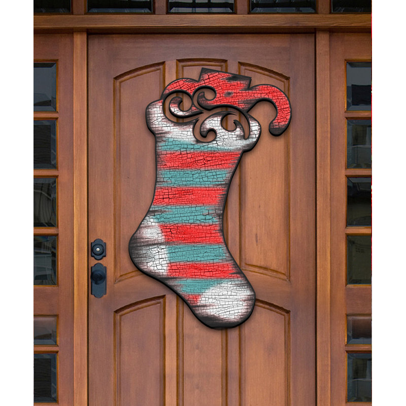 The Holiday Aisle Noel Stocking Hanging Figurine Wood Door Hanger