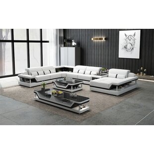 https://secure.img1-fg.wfcdn.com/im/57499455/resize-h310-w310%5Ecompr-r85/1411/141148283/Bewley+Modern+Leather+Sectional+With+Storage+116.5%22+Wide+Genuine+Leather+Modular++Corner+Sectional.jpg