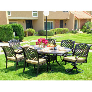 Go to store & view more images Beadle Oval 7 Piece Dining Set with Cushions by Darby Home Co