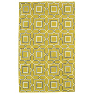 Christien Yellow Geometric Area Rug