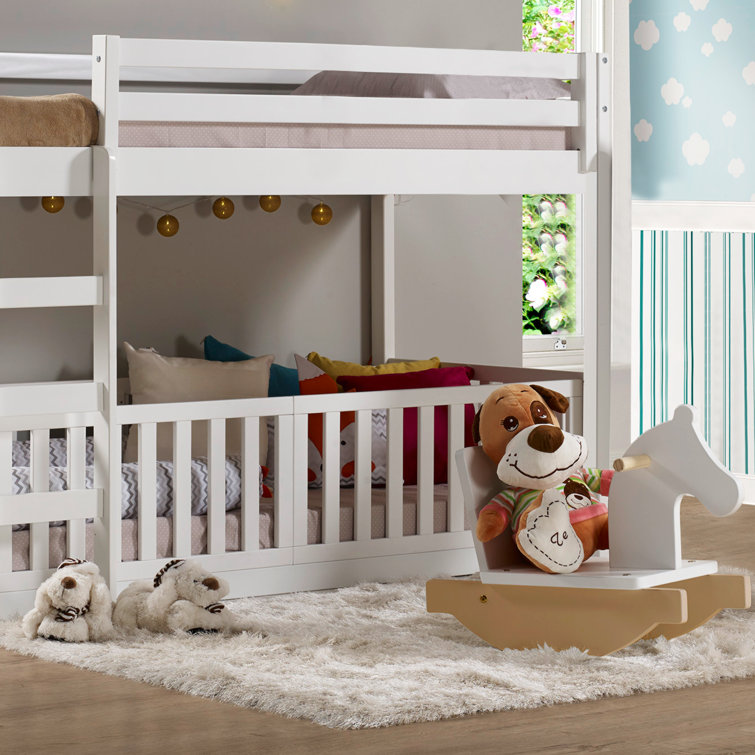 bunk bed with cot on bottom