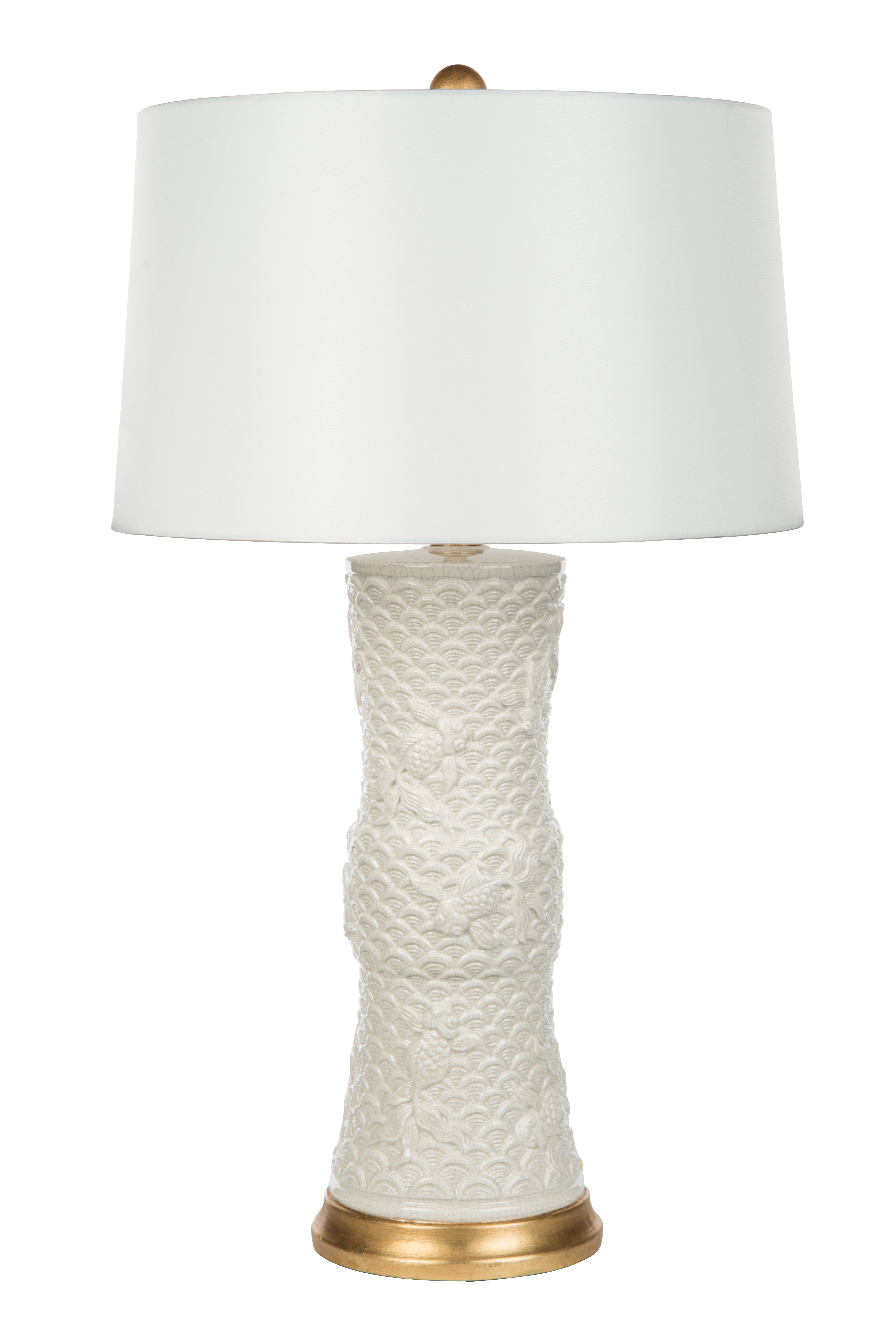 white and brass table lamp