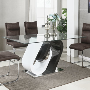 Go to store & view more images Orren Ellis Jigar Glass Top Dining Table