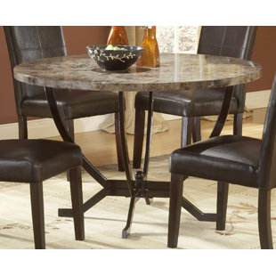 Go to store & view more images Red Barrel Studio Waltonville Round Dining Table