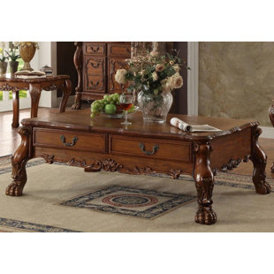 Go to store & view more images Kyra Wooden Coffee Table with Storage by Astoria Grand