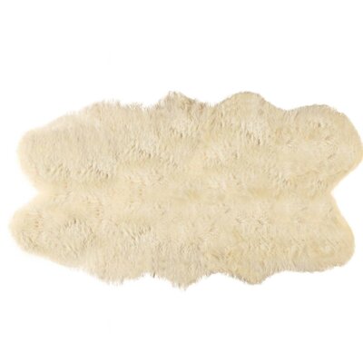 Ulverst Cowhide Chocolatewhite Area Rug Everly Quinn