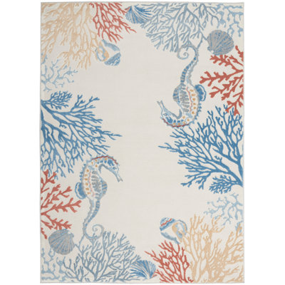 Baeza Animal Print Ivory/Blue/Red Area Rug