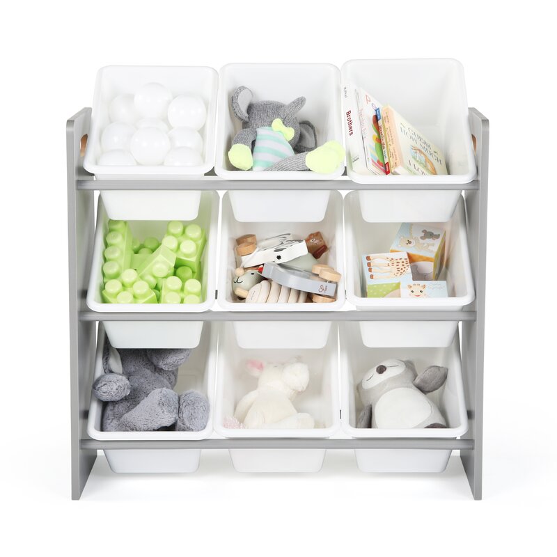 A Humble Crew Toy Organizer with nine white buckets on a grey frame holding various toddler toys. 