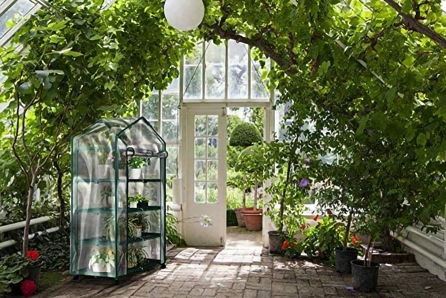 SONGMICS Garden Greenhouse Backyard 143 x 215 x 195 cm Grow House for Outdoors Roll-up Door Walk-in Plant Shed with 14 Shelves Patio Green GWP13GN Terrace
