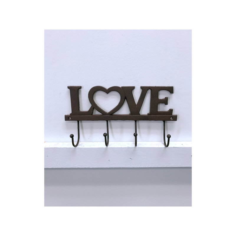 cast iron and wood coat rack