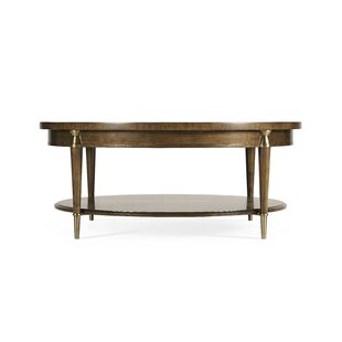 https://secure.img1-fg.wfcdn.com/im/61437445/resize-h310-w310%5Ecompr-r85/1359/135907845/Toulouse+Solid+Wood+Coffee+Table+with+Storage.jpg