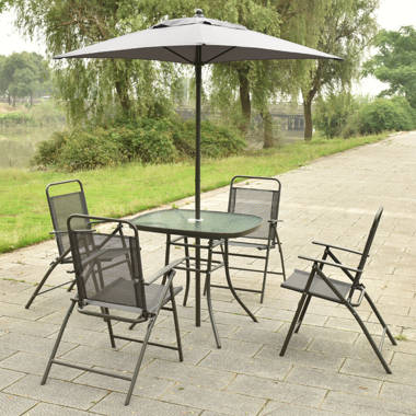 kroll 8 piece dining set with umbrella