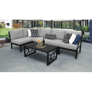 https://secure.img1-fg.wfcdn.com/im/62332600/resize-h310-w310%5Ecompr-r85/7557/75571624/kathy-ireland-madison-ave-6-piece-sectional-seating-group-with-cushions.jpg
