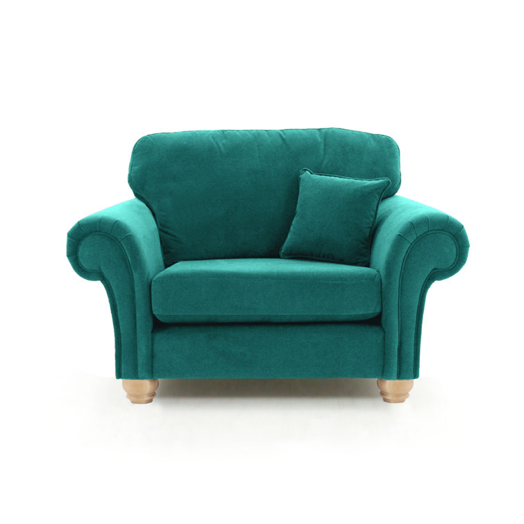 large teal armchair