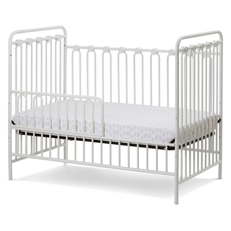 white metal convertible crib