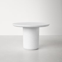 white round concrete table