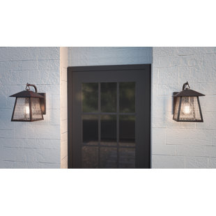 Go to store & view more images Carl Outdoor Wall Lantern by Millwood Pines