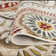Charlton Home® Kasturi Power Loom Performance Ivory/Mocha/Wine Red Rug ...