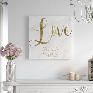 Love Never Fails Distressed White 16 x 7 Wood Wall Plaque 