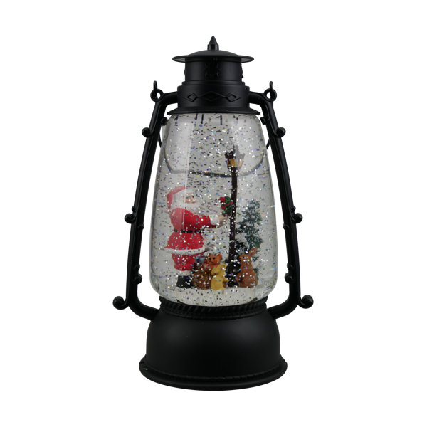 The Holiday Aisle® Round Lantern with Santa Scene, Glitter Swirling