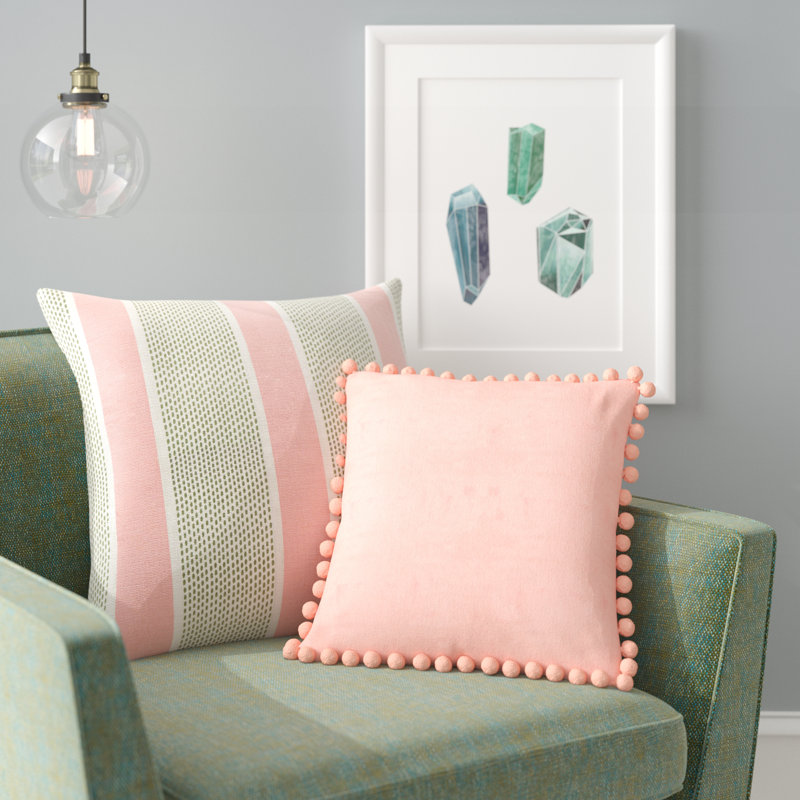 blush pom pom cushion