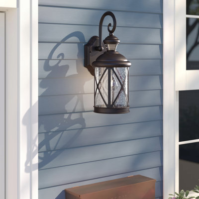 Drishya Textured Black 16.5'' H Seeded Glass Outdoor Wall Lantern with Dusk to Dawn