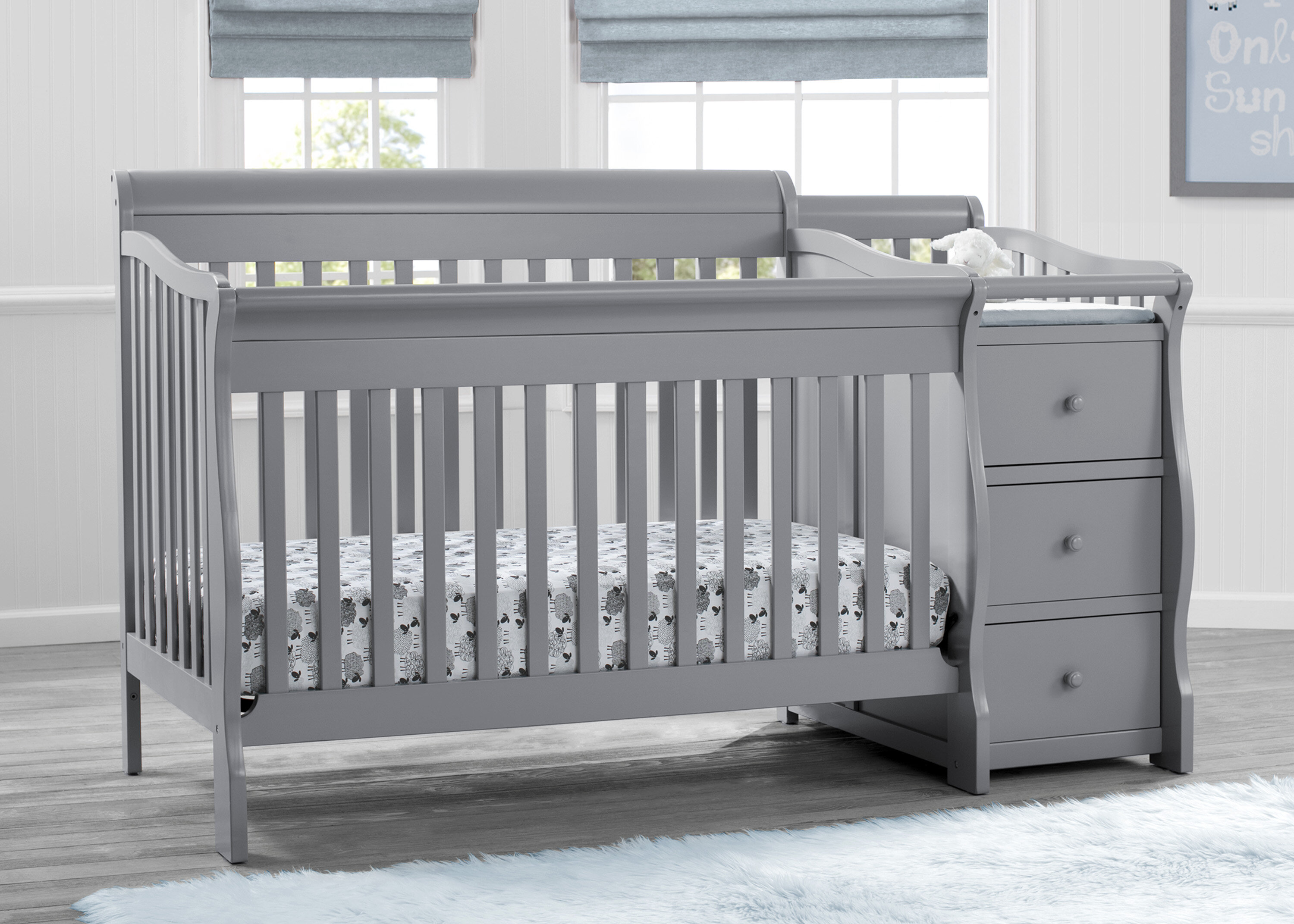 grey convertible crib with changing table