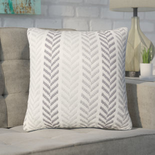 grey and beige pillows