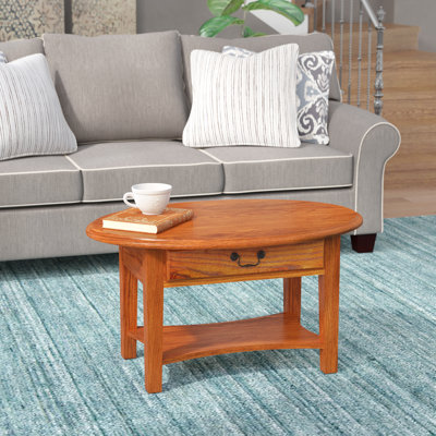 oval solid wood coffee table
