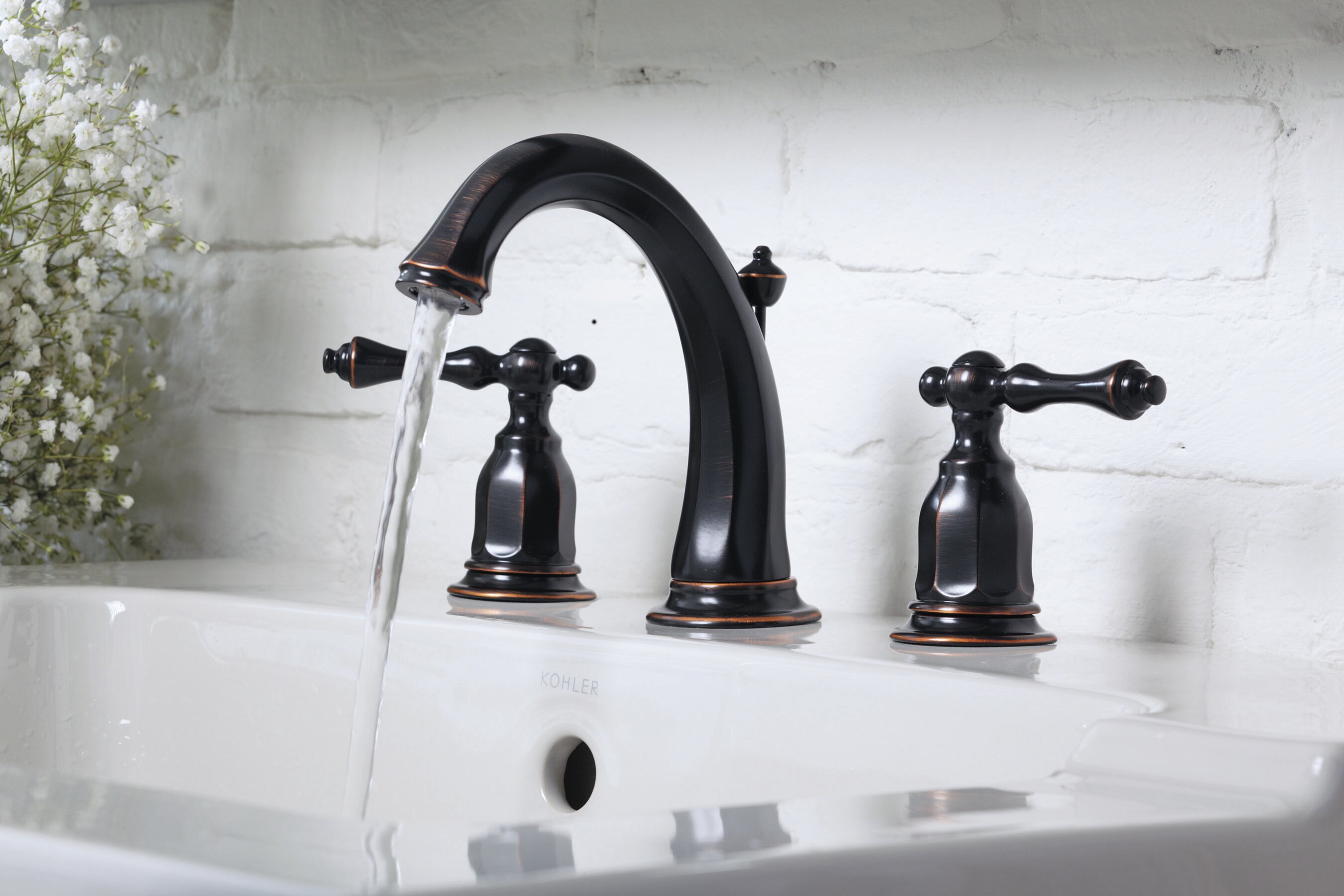 kelston widespread bathroom sink faucet with drain assembly