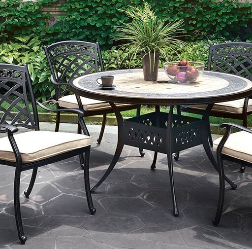 concrete and metal outdoor dining table