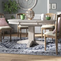 round dining table with self storing leaf