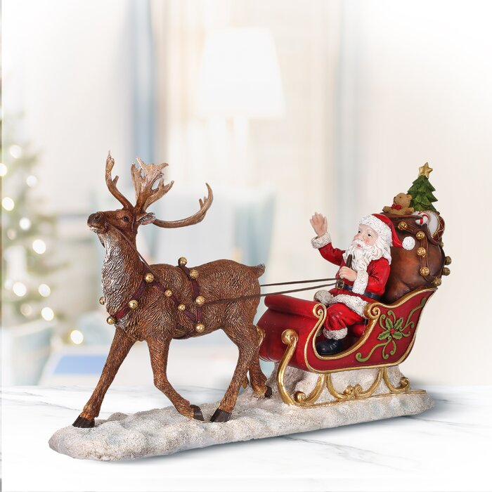 The Holiday Aisle® Resin Santa In Sleigh W/Reindeer | Wayfair